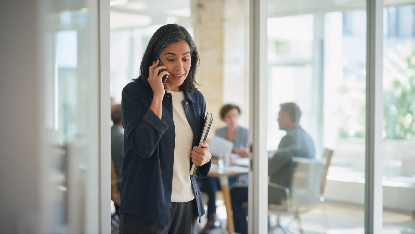 An executive search consultant reviewing candidate profiles for a senior leadership role